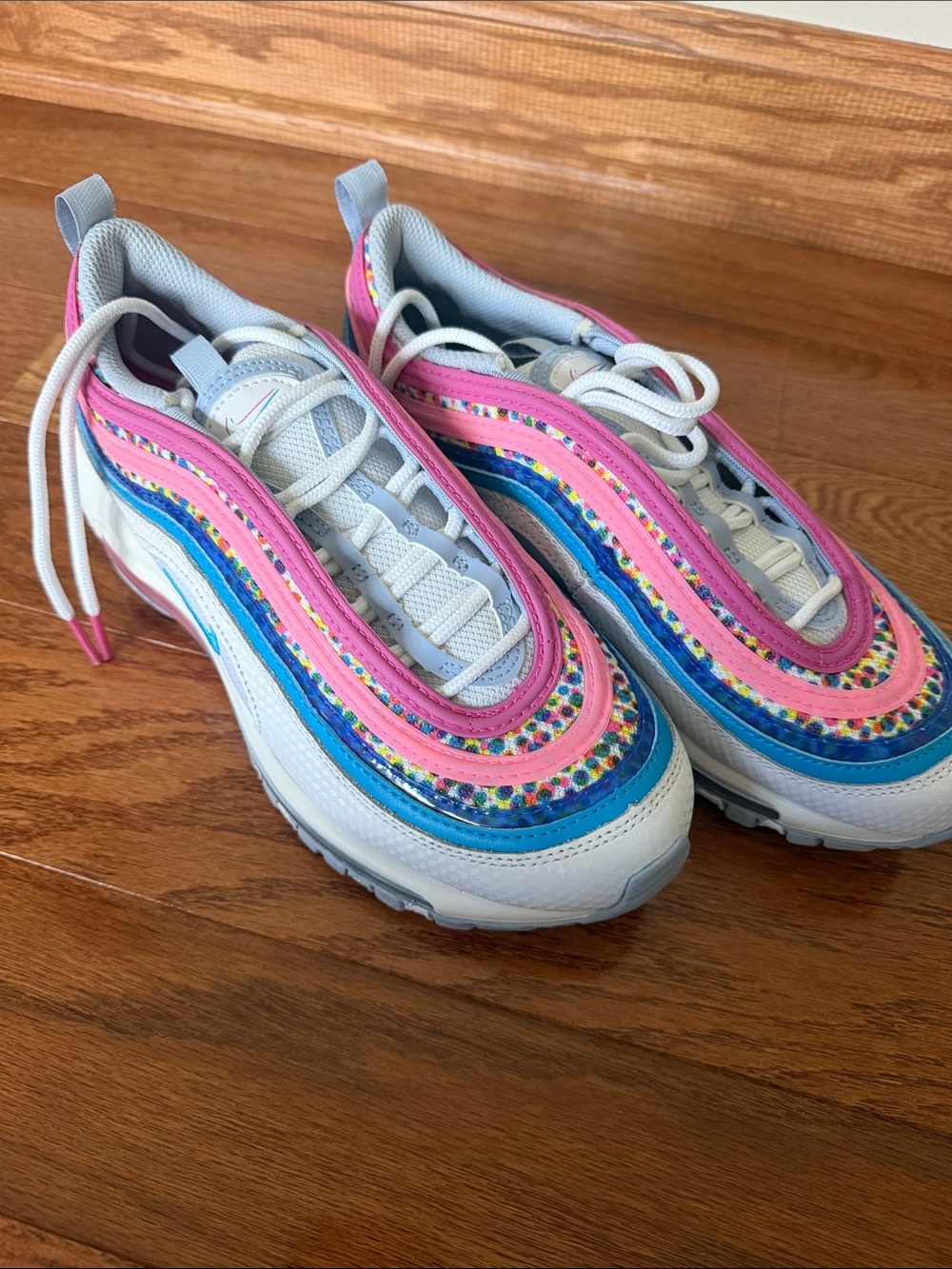 Nike Kids White Sneakers with Pink & Blue Accents